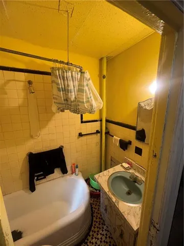 a bathroom with a sink and toilet