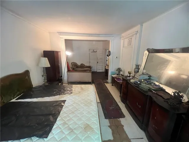 a kitchen with a table and chairs