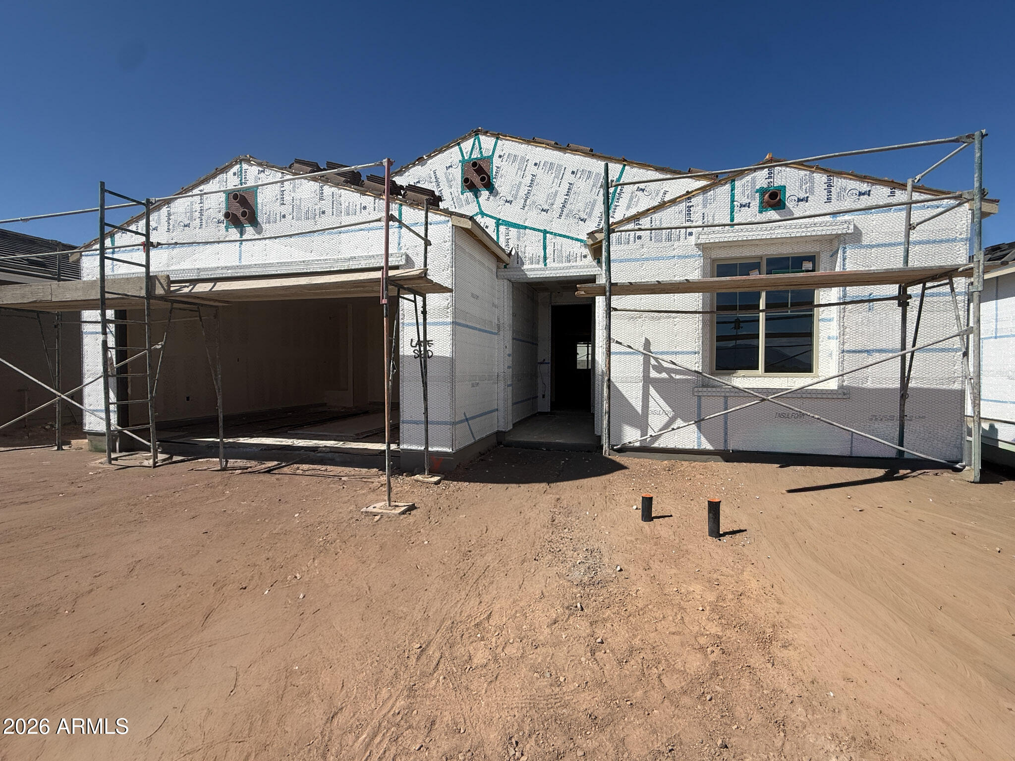 9622 West Gaby Road Tolleson, AZ 85353 - Photo 2 of 13 a view of a house with large windows