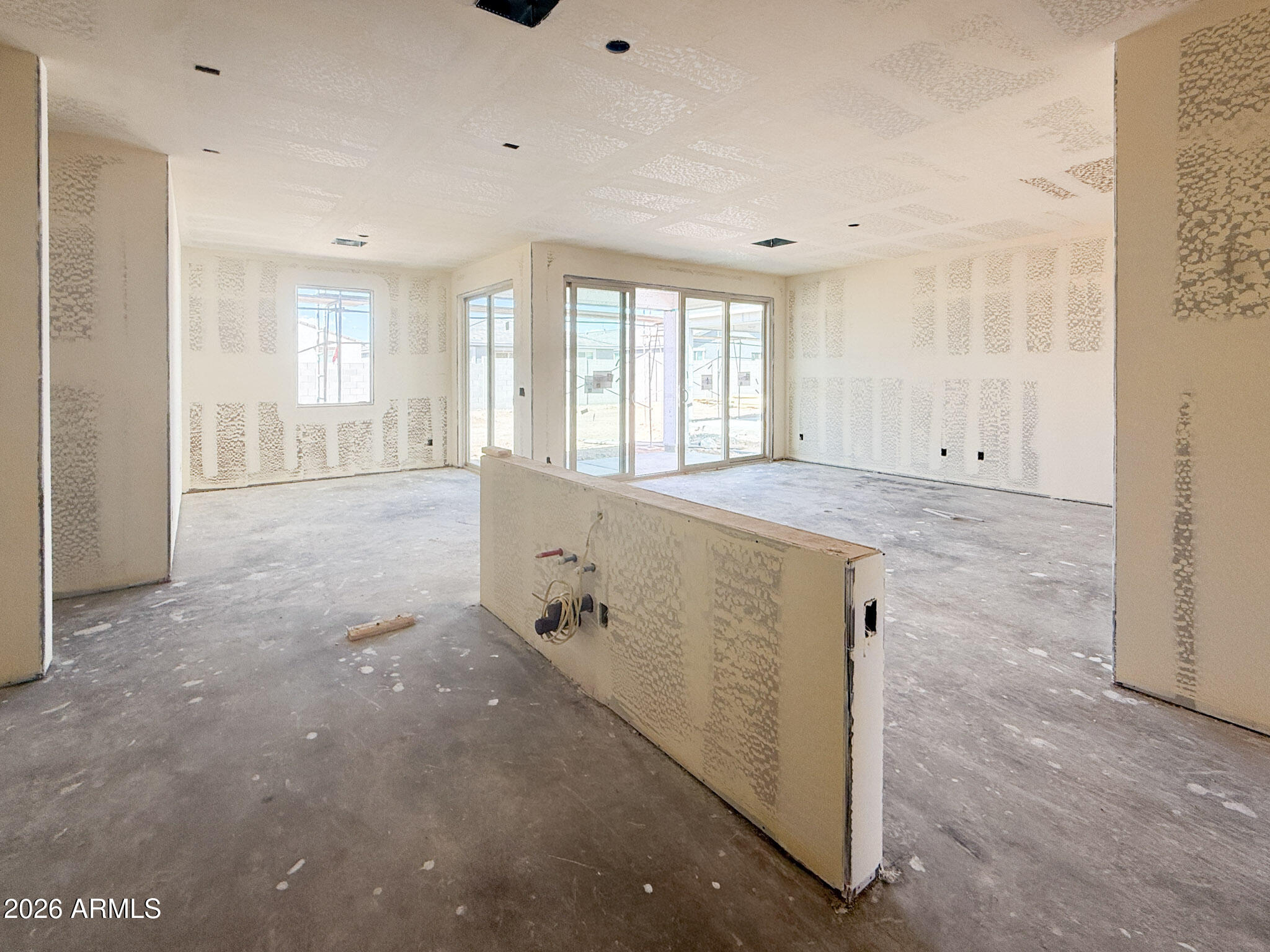 9622 West Gaby Road Tolleson, AZ 85353 - Photo 3 of 13 a view of an empty room with a window