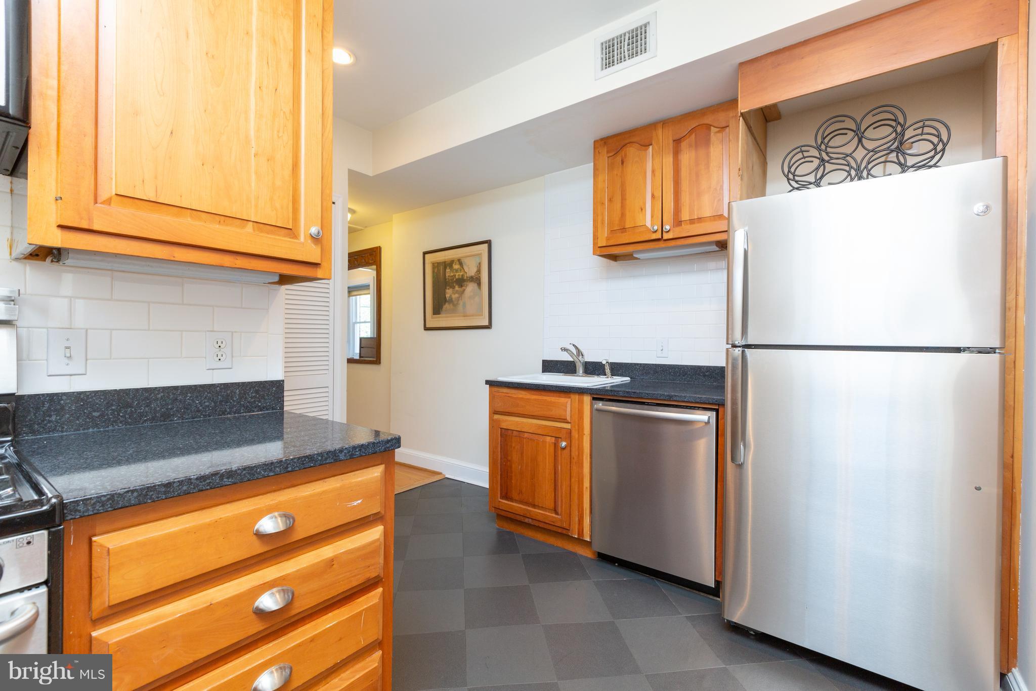 2321 Ashmead Place Northwest Washington, DC 20009 - Photo 18 of 30 Unit 2 Kitchen w/ Granite Counters/Stainless Steel