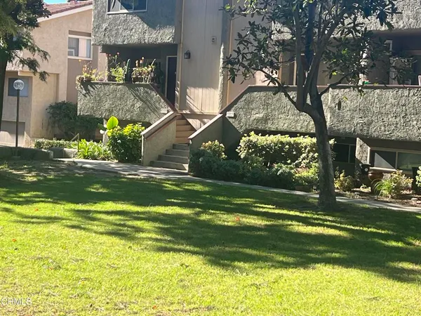 a view of a house with a swimming pool