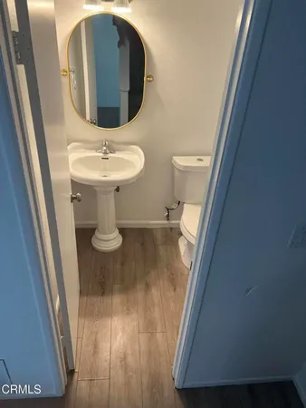 a street sign on a pole on a street