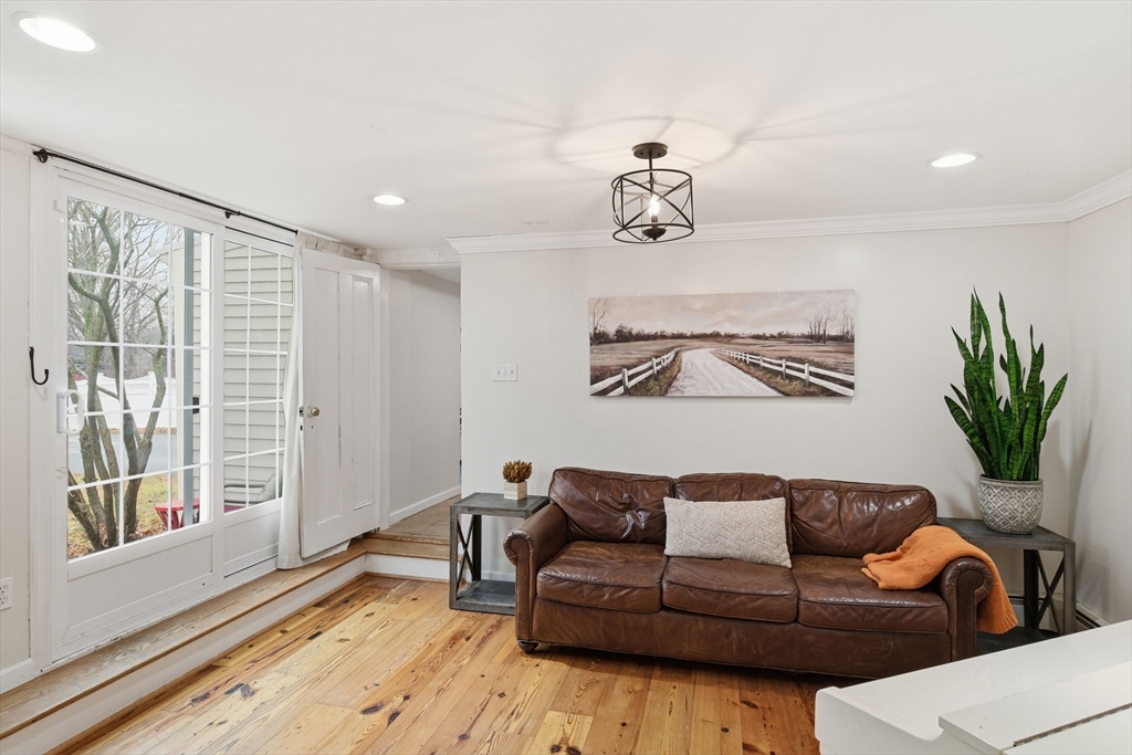 271 North Grand Street Suffield, CT 06093 - Photo 20 of 42 a view of a livingroom with furniture and wooden floor