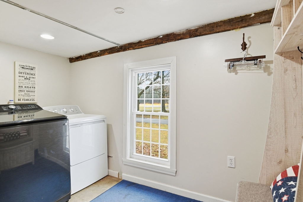 271 North Grand Street Suffield, CT 06093 - Photo 22 of 42 a kitchen with sink cabinets and window