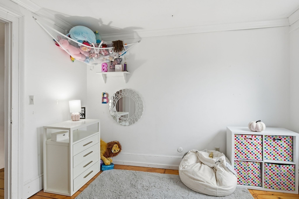 271 North Grand Street Suffield, CT 06093 - Photo 29 of 42 a bathroom with a sink mirror vanity and toilet