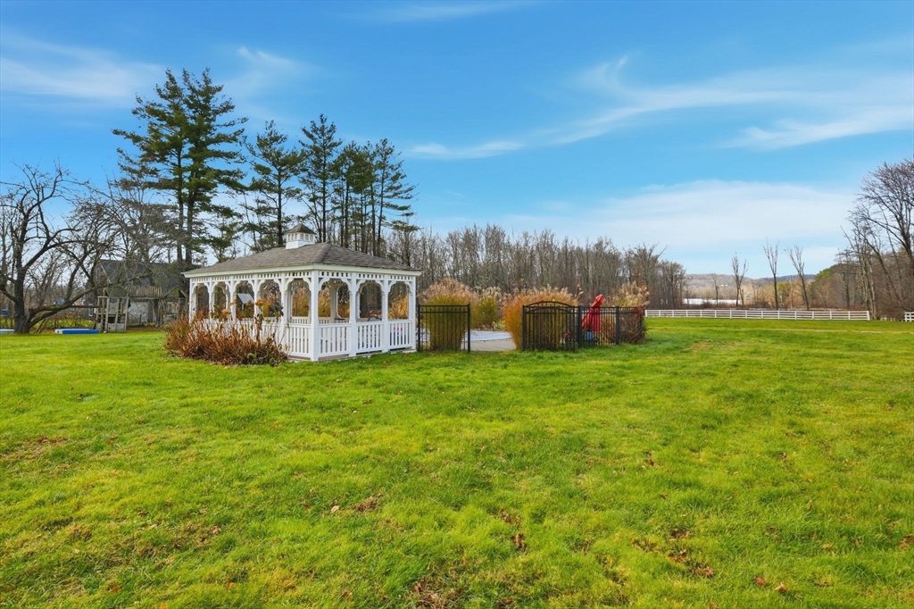 271 North Grand Street Suffield, CT 06093 - Photo 39 of 42 a view of a house with a yard