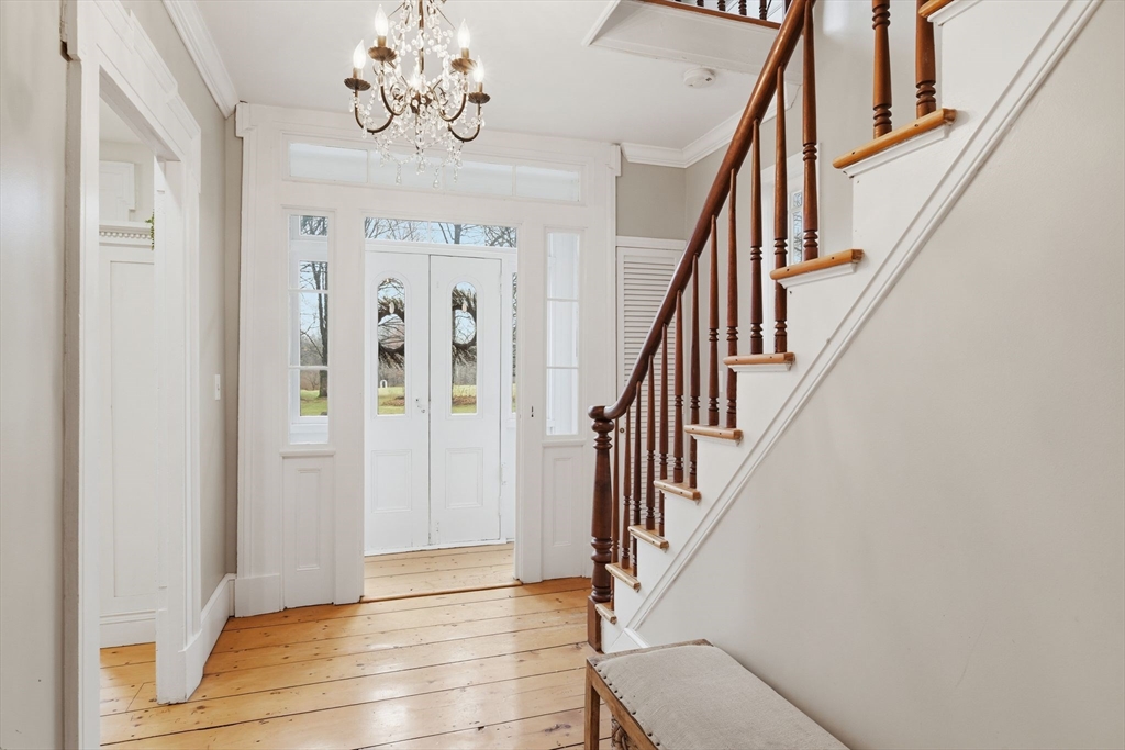 271 North Grand Street Suffield, CT 06093 - Photo 5 of 42 a view of entryway with wooden floor