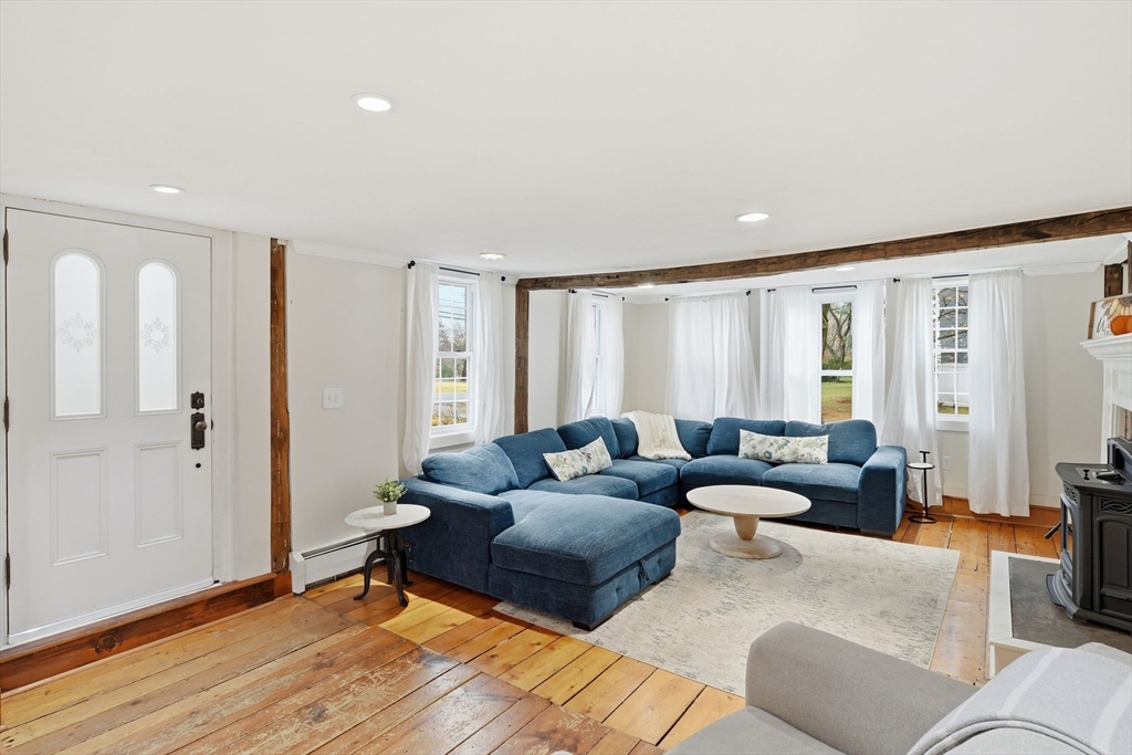 271 North Grand Street Suffield, CT 06093 - Photo 8 of 42 a living room with furniture and a window