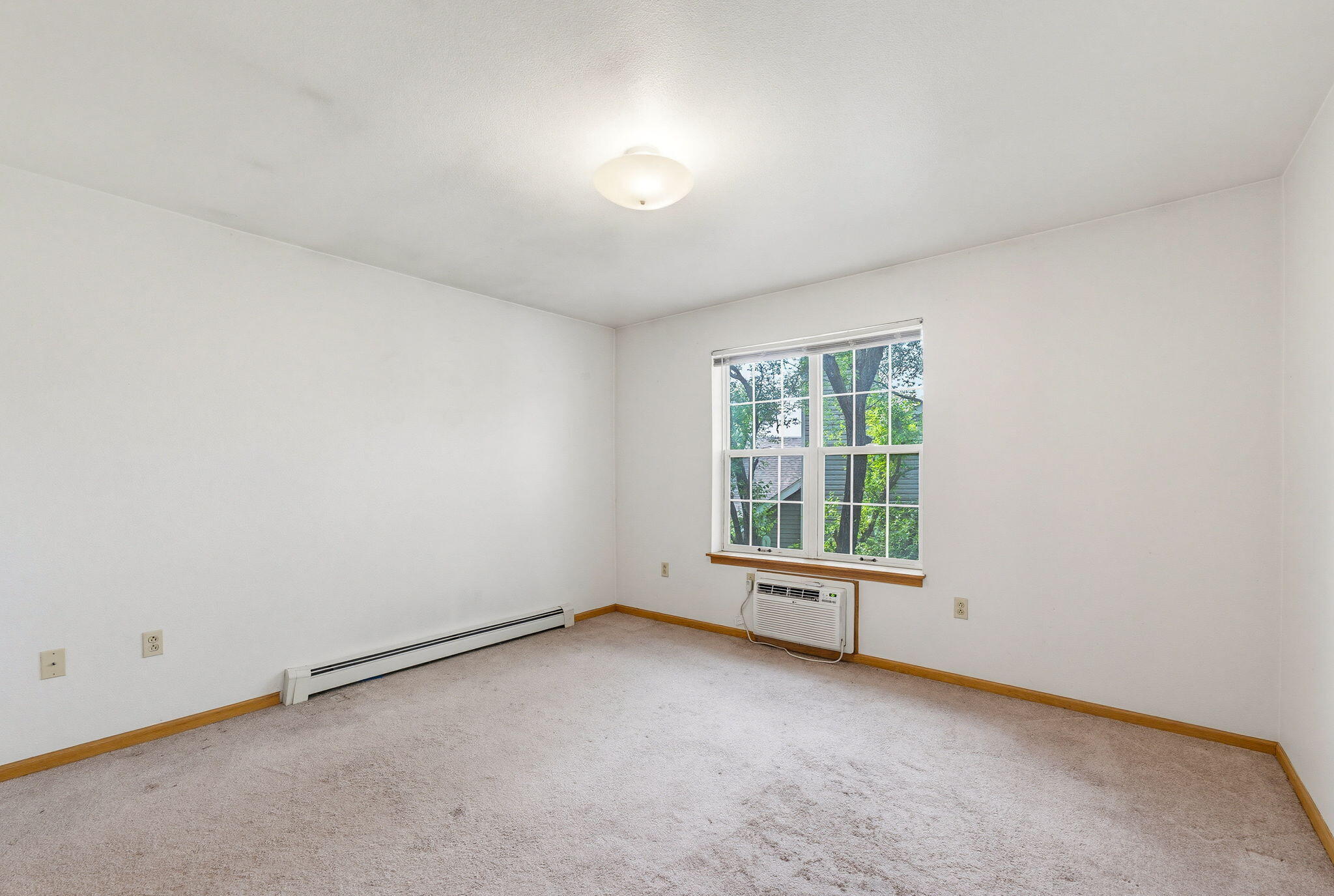 7307 North Port Washington Road, Unit 315 Glendale, WI 53217 - Photo 13 of 30 Master Bedroom
