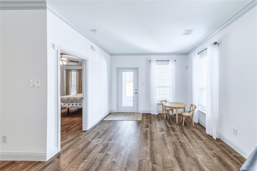 201 Brookview Drive Lavon, TX 75166 - Photo 13 of 33 a view of a livingroom with wooden floor and furniture