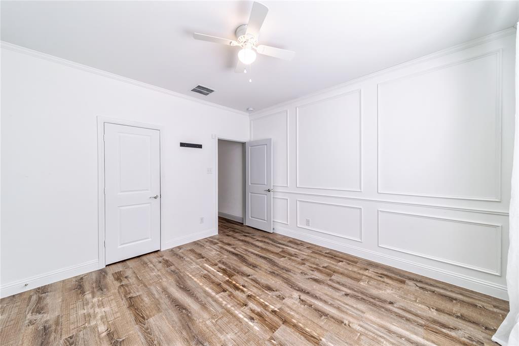 201 Brookview Drive Lavon, TX 75166 - Photo 18 of 33 a view of a livingroom with wooden floor and closet