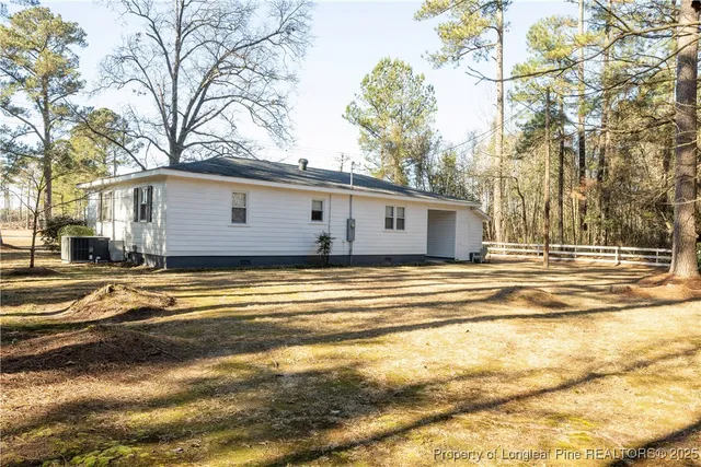 a view of a house with a swimming pool
