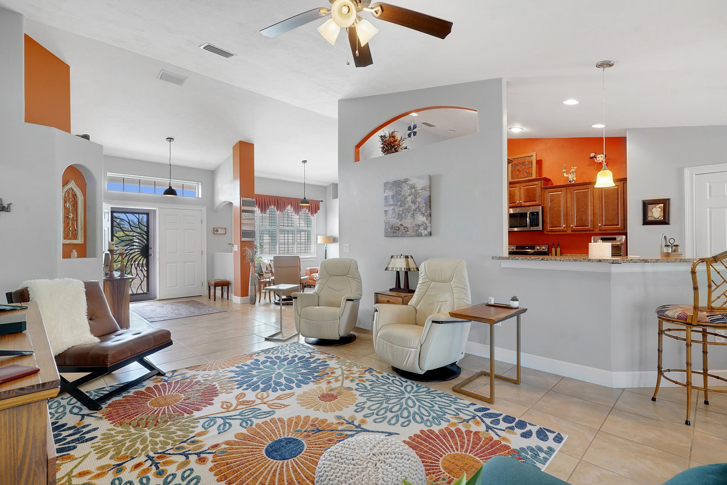 121 Harrison Road Daytona Beach, FL 32118 - Photo 11 of 48 a living room with furniture and wooden floor