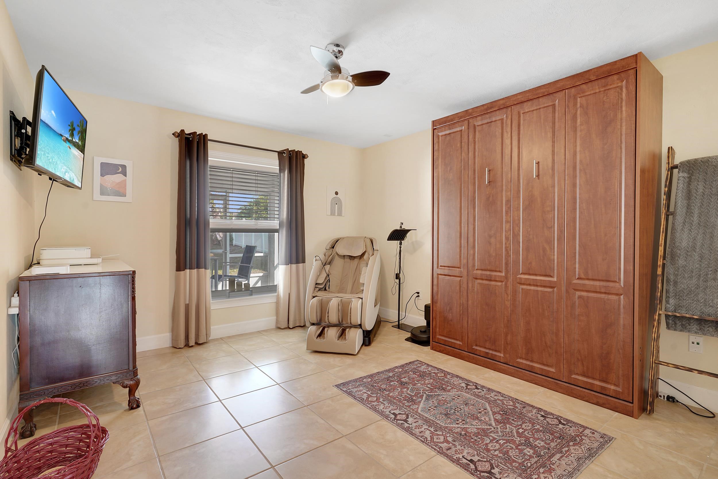 121 Harrison Road Daytona Beach, FL 32118 - Photo 27 of 48 a view of living room with furniture and a rug