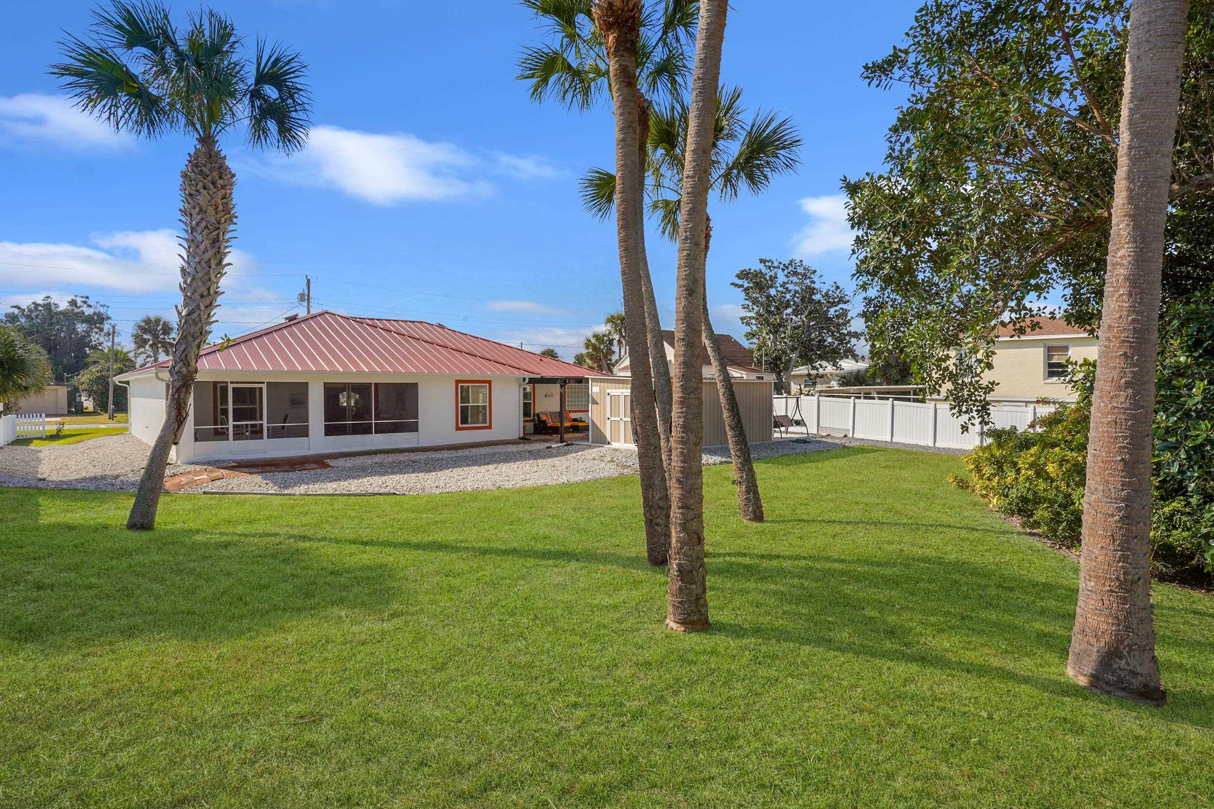 121 Harrison Road Daytona Beach, FL 32118 - Photo 33 of 48 a front view of a house with garden