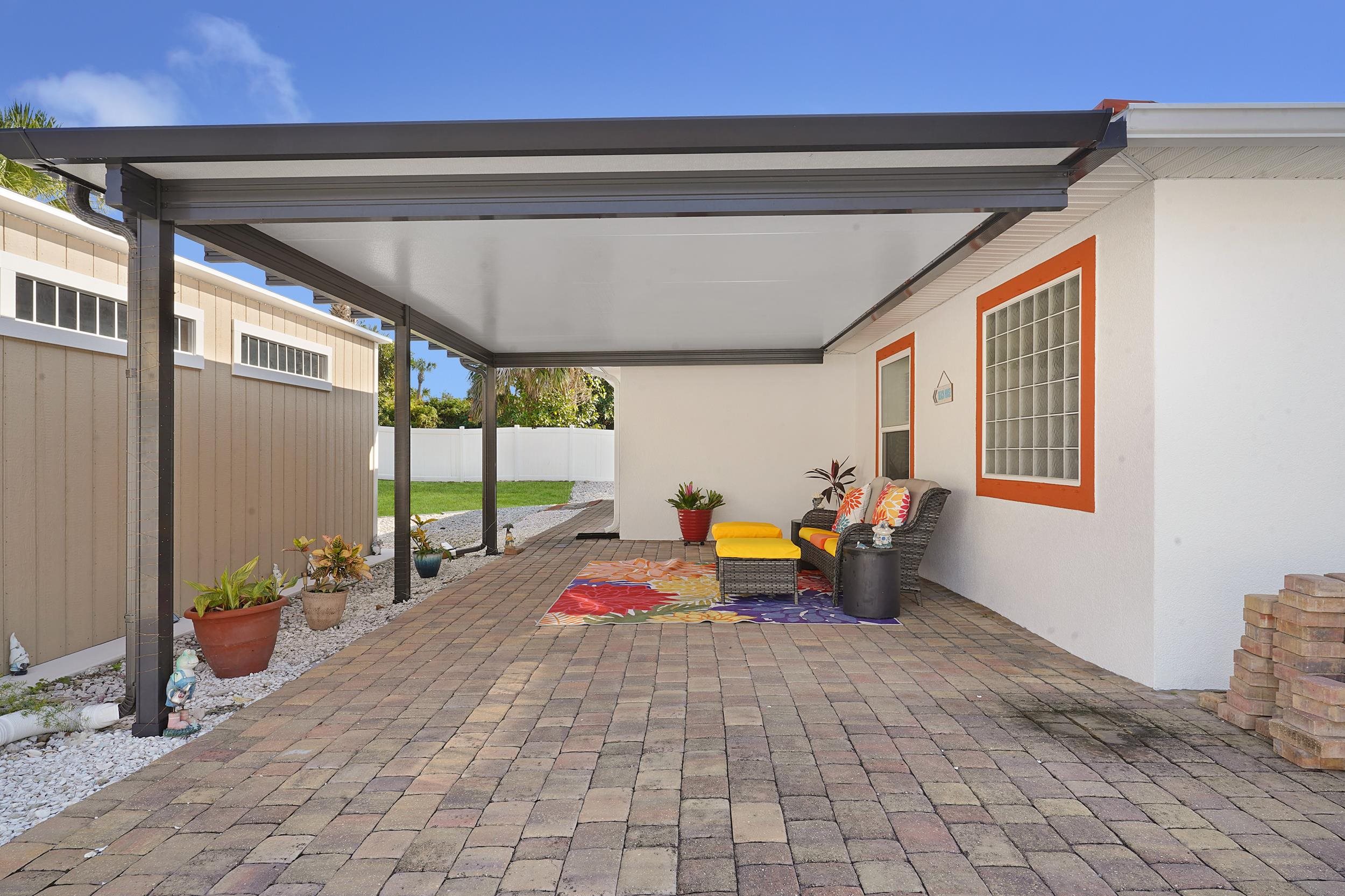 121 Harrison Road Daytona Beach, FL 32118 - Photo 37 of 48 a bedroom with furniture and a window