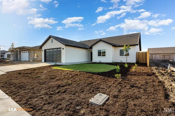 a house view with a backyard space