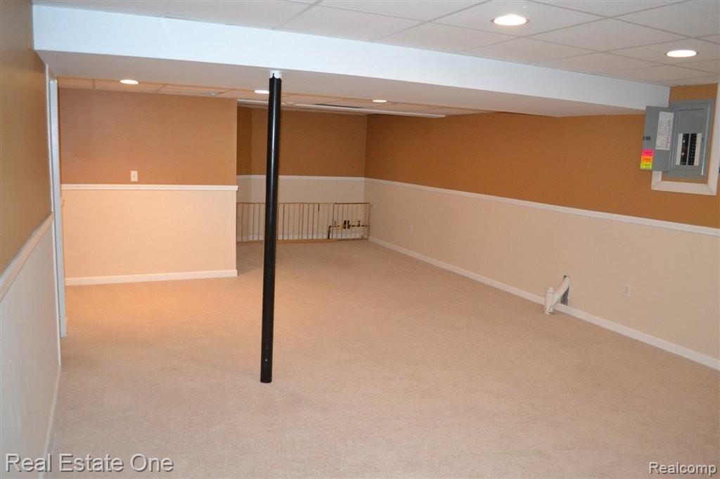 45586 Rathmore Drive, Unit 276 Macomb, MI 48044 - Photo 22 of 25 Finished Basement