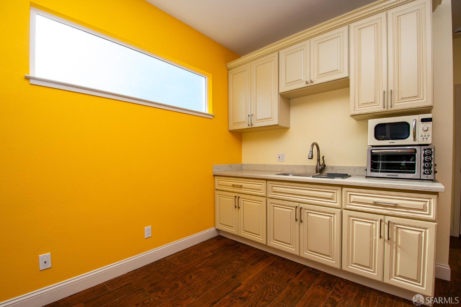 40 Encina Avenue Monterey, CA 93940 - Photo 12 of 23 a kitchen with stainless steel appliances a sink and cabinets