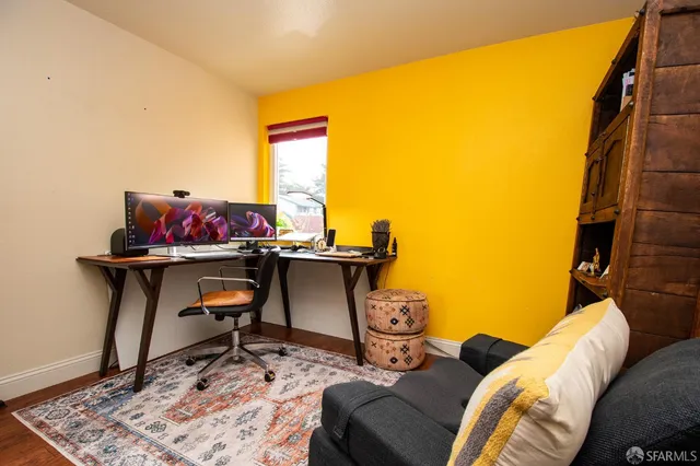 a living room with a couch and a table