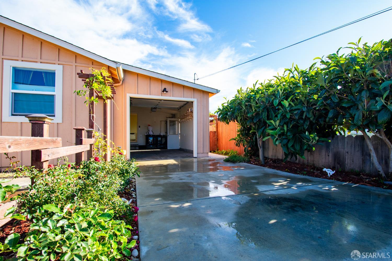 40 Encina Avenue Monterey, CA 93940 - Photo 2 of 23 a view of a patio with table and chairs and potted plants