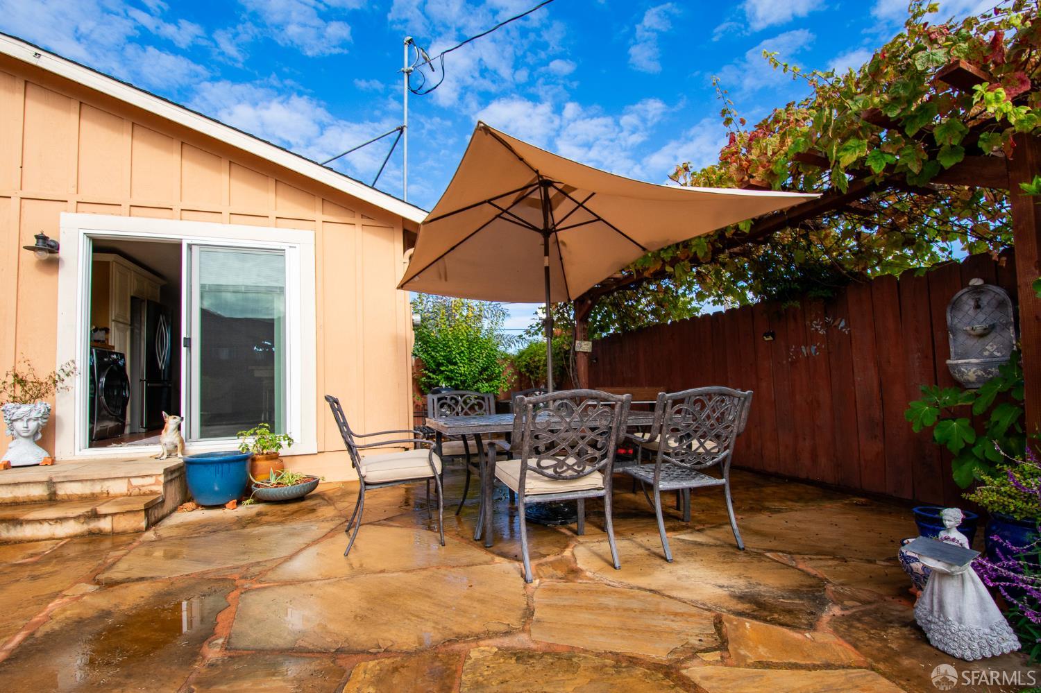 40 Encina Avenue Monterey, CA 93940 - Photo 21 of 23 a patio with table and chairs