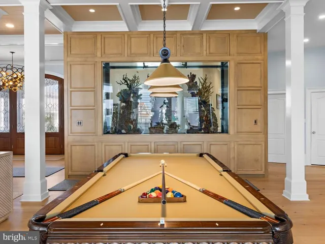 a dining room with furniture and a fireplace