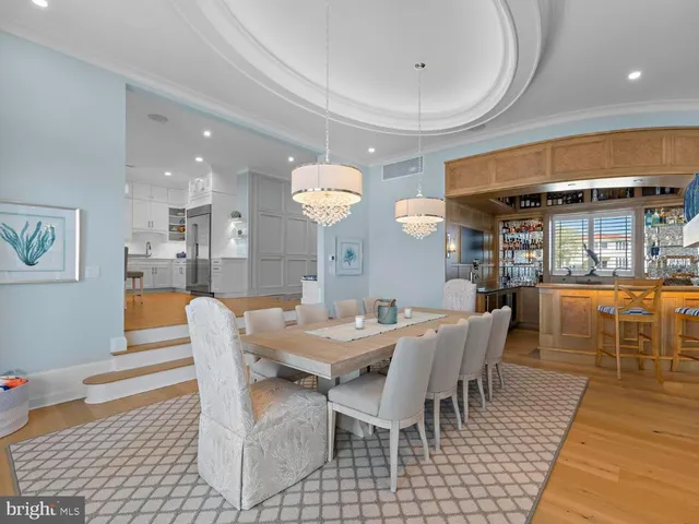 a kitchen with stainless steel appliances a stove microwave and cabinets