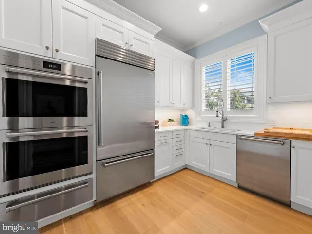 a view of a swimming pool and lounge chair