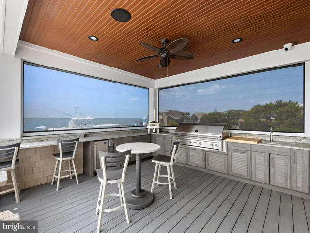 a bathroom with a sink mirror vanity and toilet