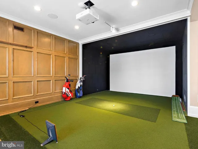 a bathroom with a double vanity sink toilet mirror and bathtub