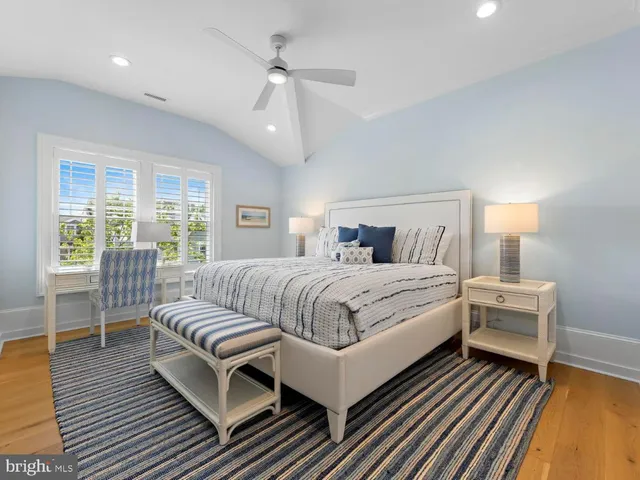 a view of a balcony with mountain view and wooden floor