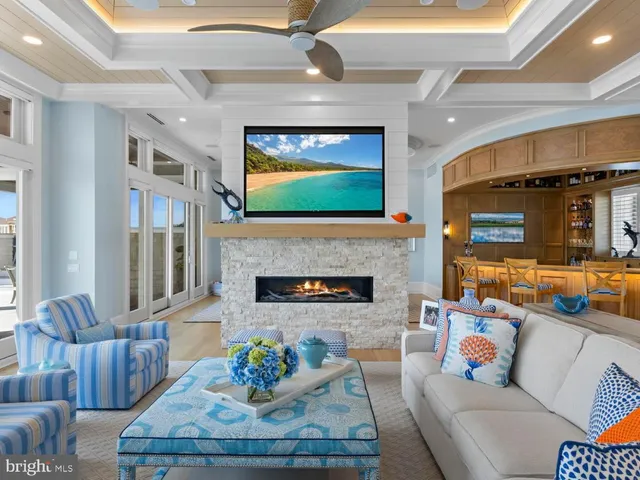 a room with pool table and windows