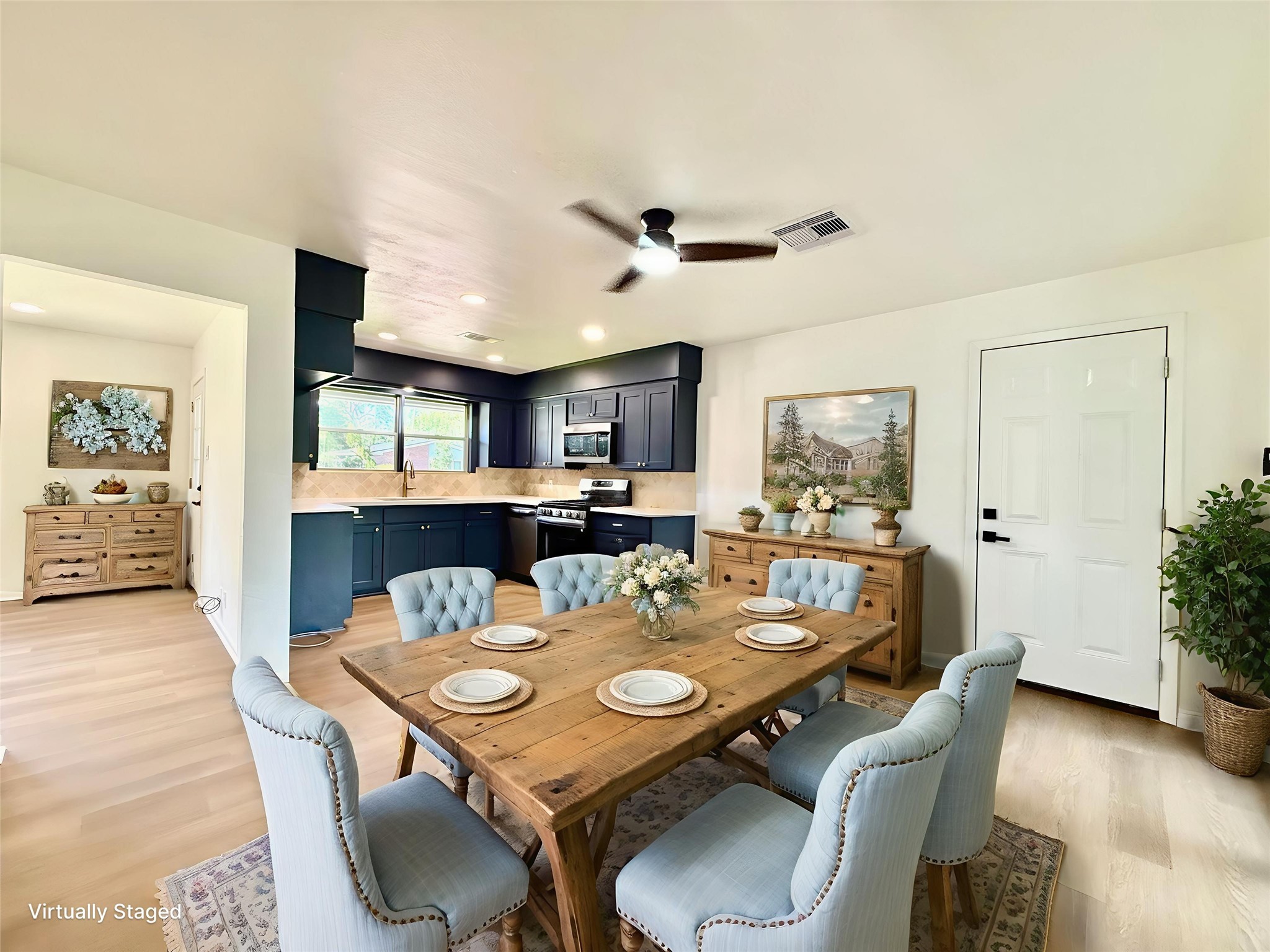 129 Chestnut Street Lake Jackson, TX 77566 - Photo 8 of 20 Experience seamless living in this inviting kitchen-dining area, perfect for cooking and entertaining.