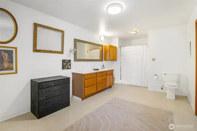 a view of a house with sitting area and view of a swimming pool