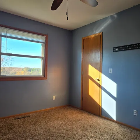 an empty room with window