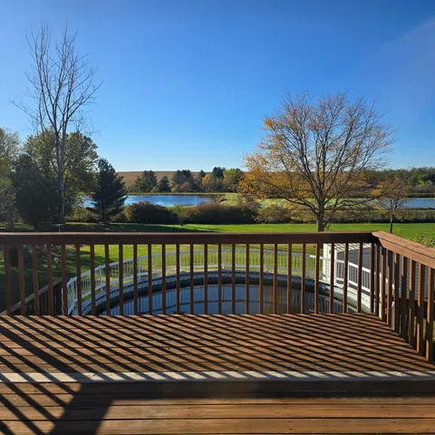 a view of wooden balcony with outdoor space