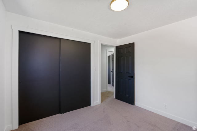 432 Calnette Drive Sandy, UT 84070 - Photo 20 of 48 Spacious room featuring neutral carpeting and white walls
