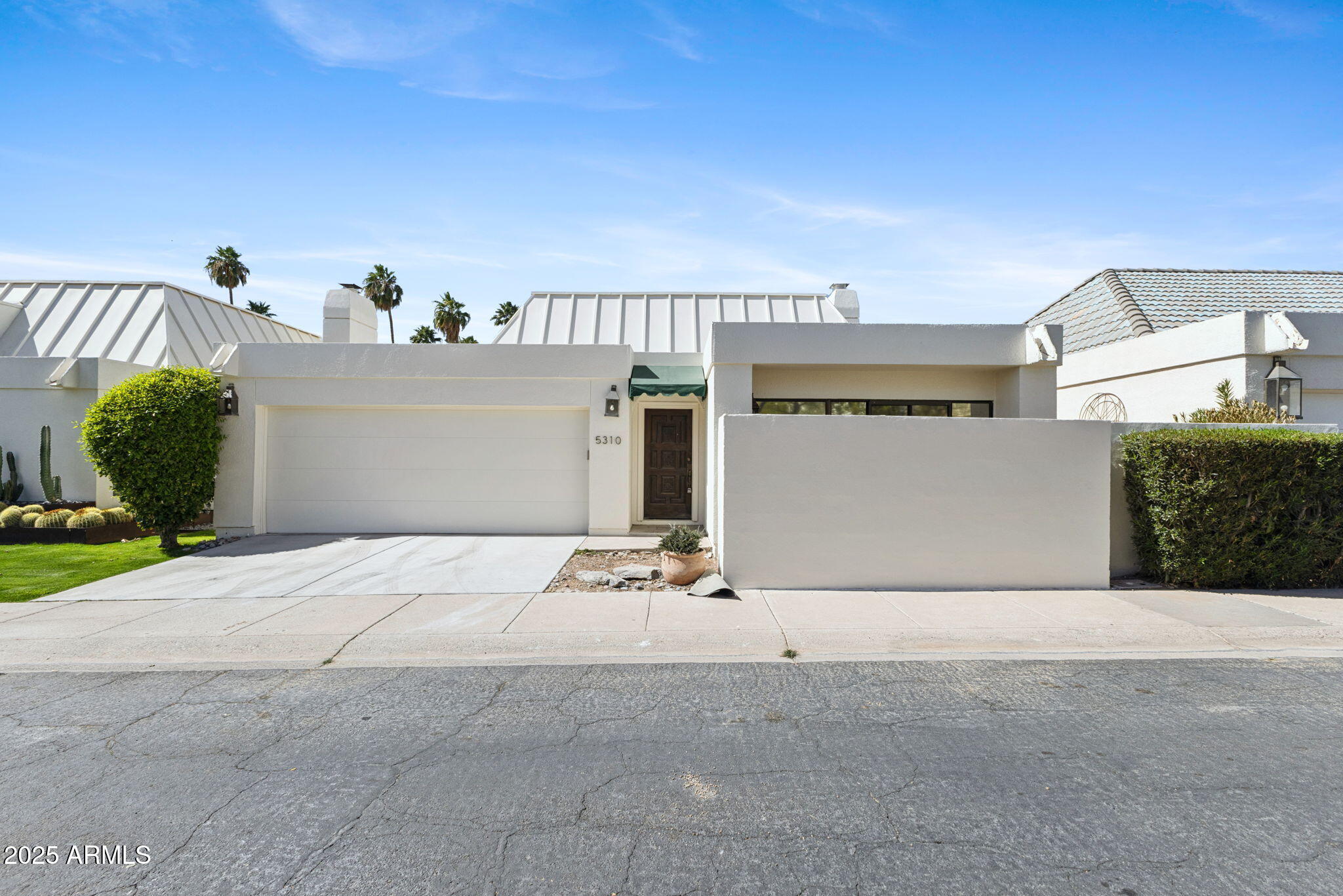 a view of a house with garage