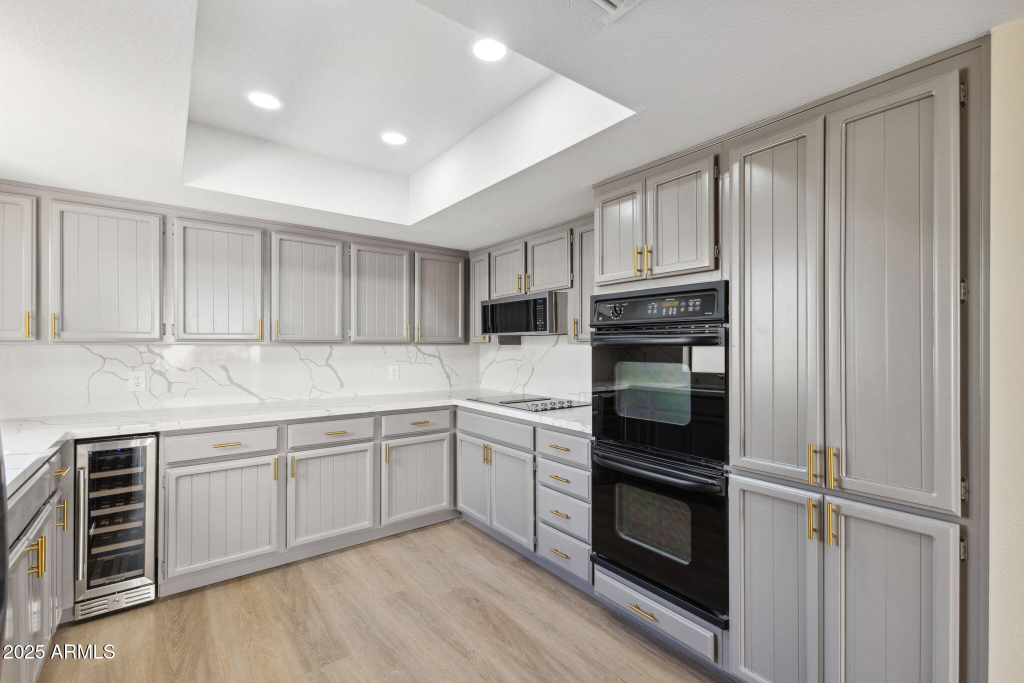 5310 North 24th Place Phoenix, AZ 85016 - Photo 13 of 35 a kitchen with granite countertop stainless steel appliances and wooden cabinets