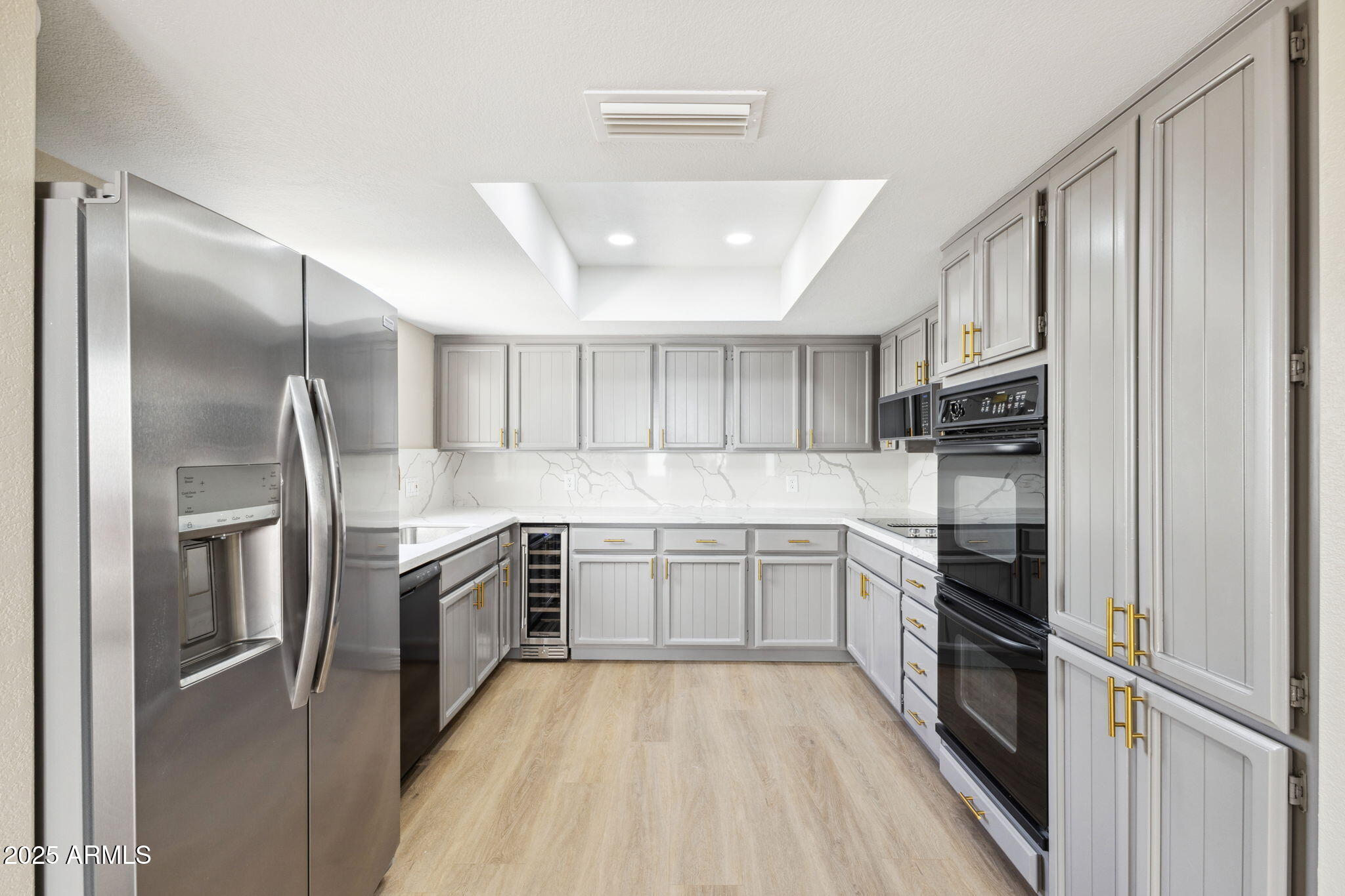 5310 North 24th Place Phoenix, AZ 85016 - Photo 14 of 35 a kitchen with stainless steel appliances granite countertop a refrigerator and a stove top oven