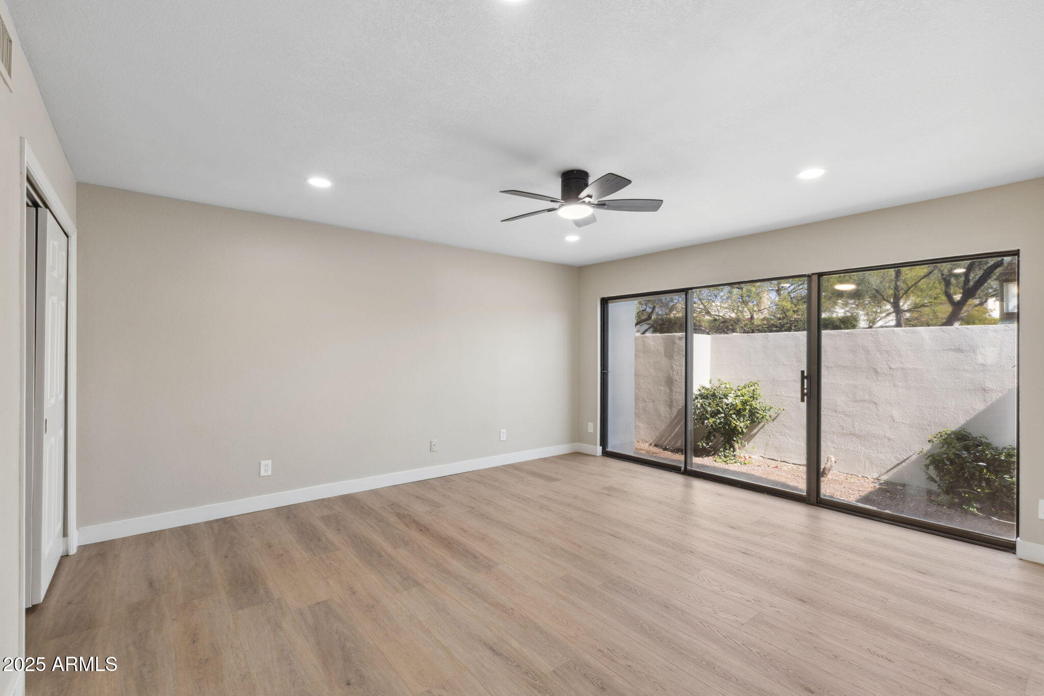 5310 North 24th Place Phoenix, AZ 85016 - Photo 15 of 35 a view of an empty room with a window