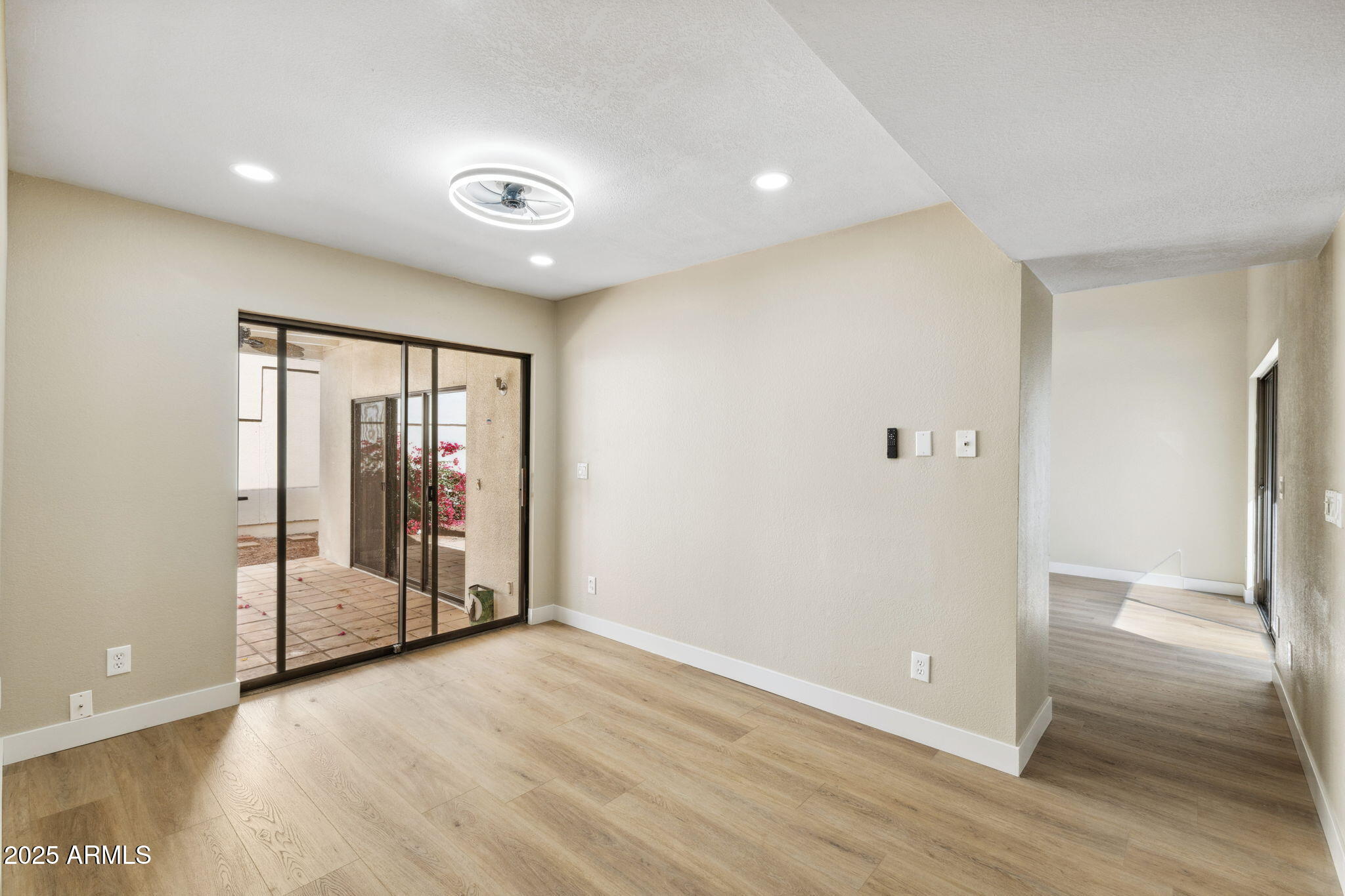 5310 North 24th Place Phoenix, AZ 85016 - Photo 23 of 35 a view of a big room with wooden floor and windows