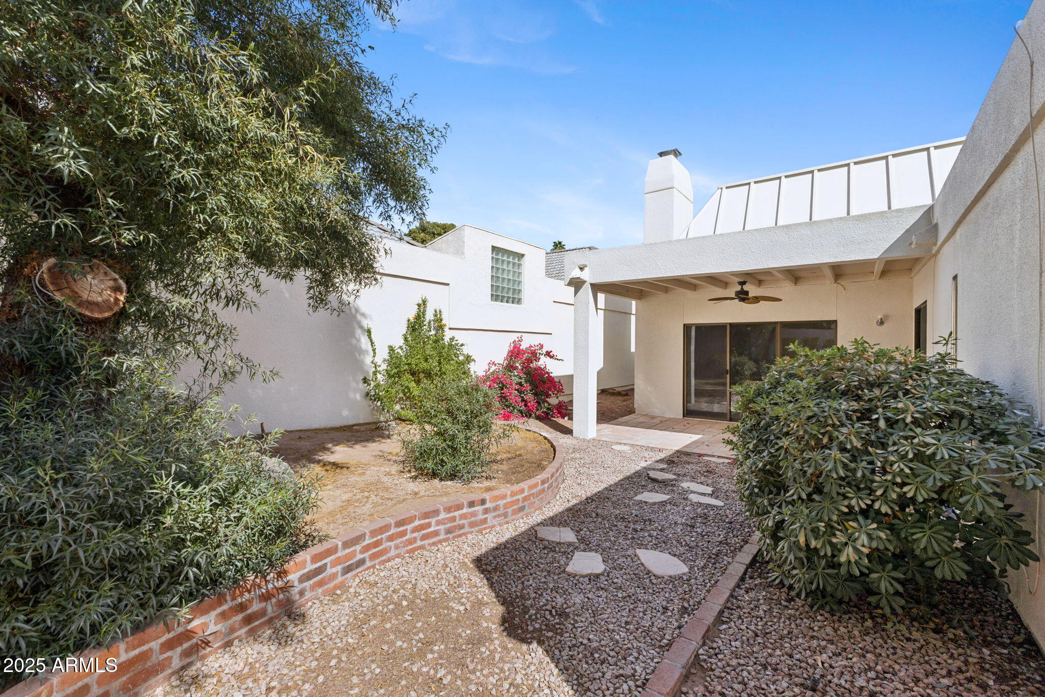 5310 North 24th Place Phoenix, AZ 85016 - Photo 30 of 35 a front view of a house with a yard
