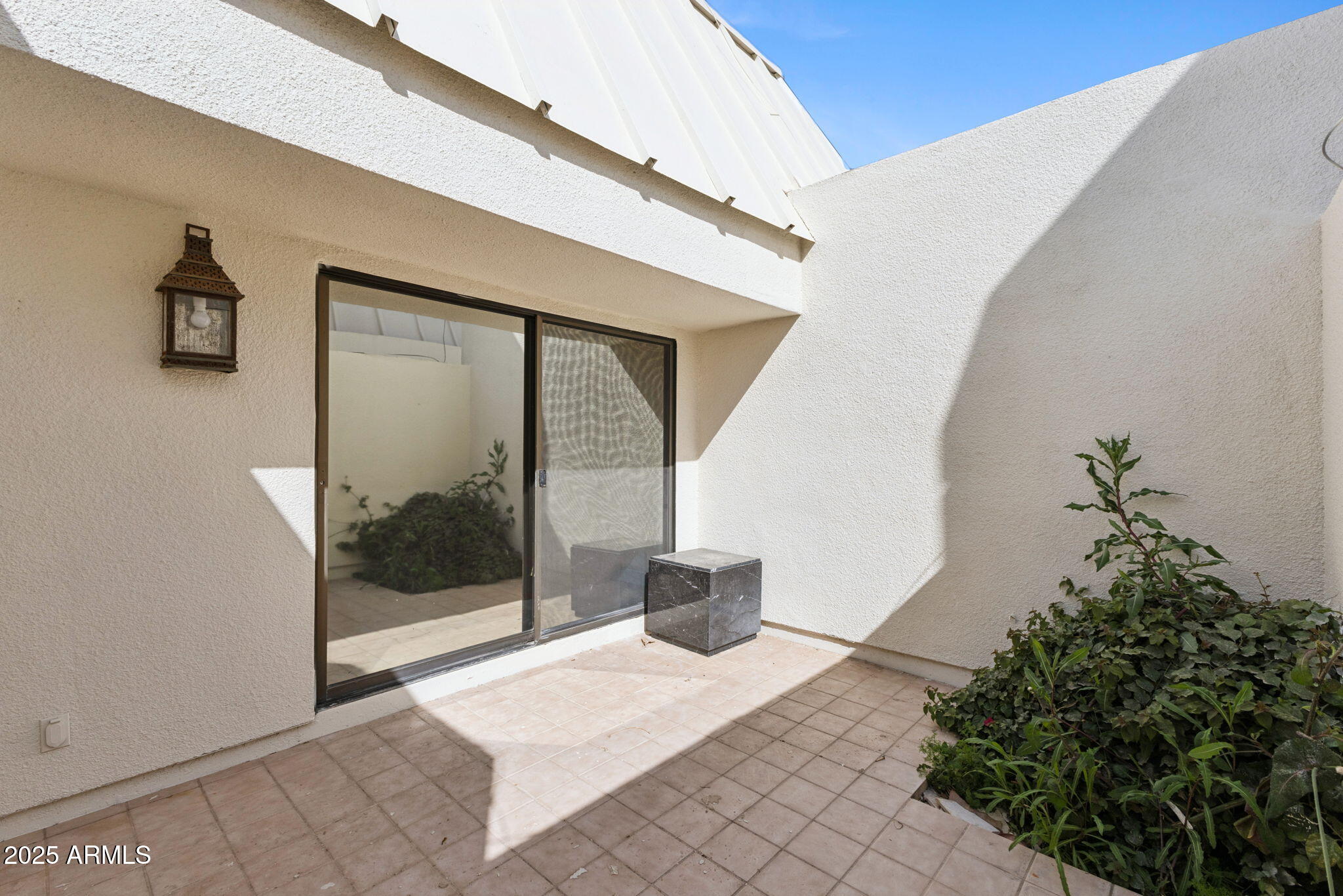 5310 North 24th Place Phoenix, AZ 85016 - Photo 34 of 35 a view of a hallway and a potted plant