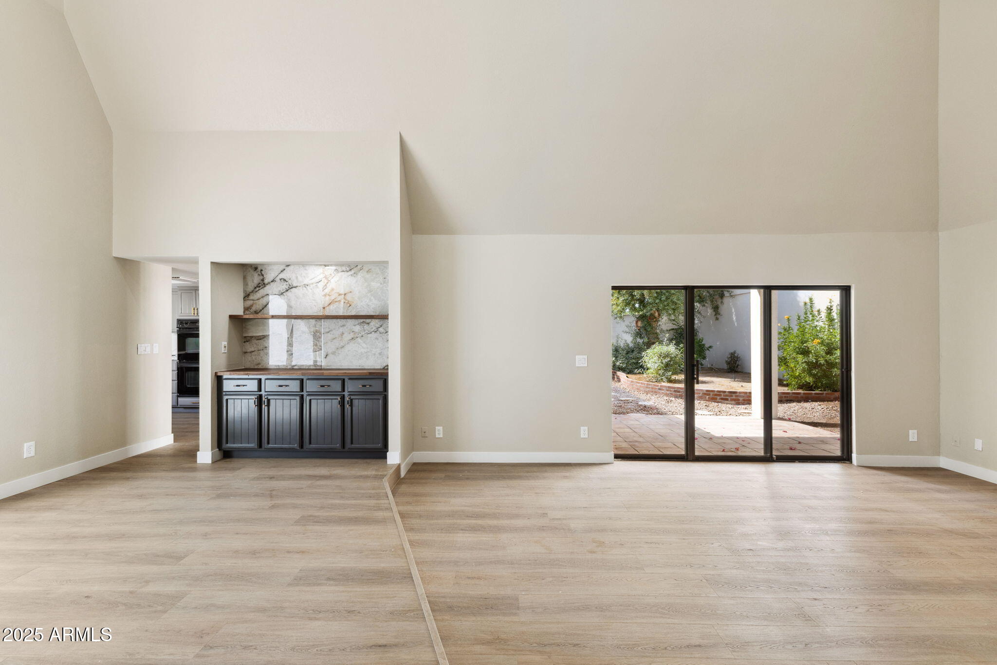 5310 North 24th Place Phoenix, AZ 85016 - Photo 5 of 35 a view of a livingroom with wooden floor and furniture