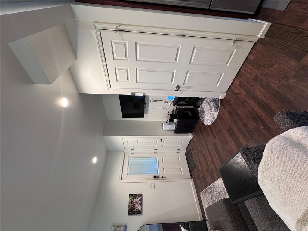 130 Hidden Spur Road Lehighton, PA 18235 - Photo 7 of 19 Rich hardwood floors complement this inviting living space with recessed lighting and a classic paneled door.