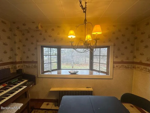 a view of a room with a window