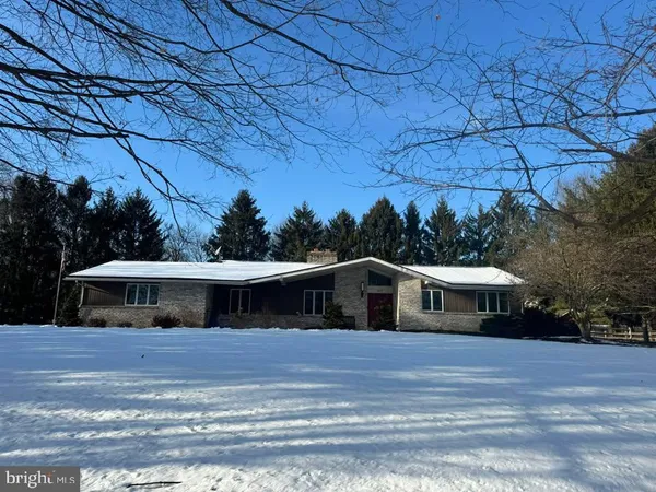 a front view of house with a yard